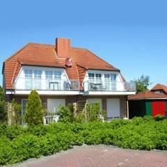 Ferienwohnung - lichtdurchflutet, freundlich - mit Strandkorb am Strand - Hooksiel